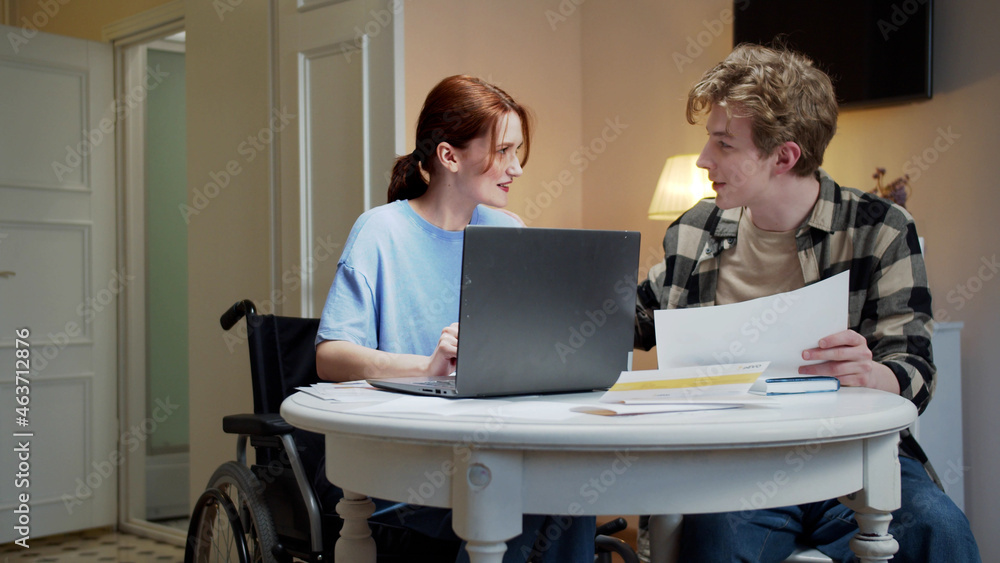 Two friends are speaking and laughing together Two friends are speaking and laughing together