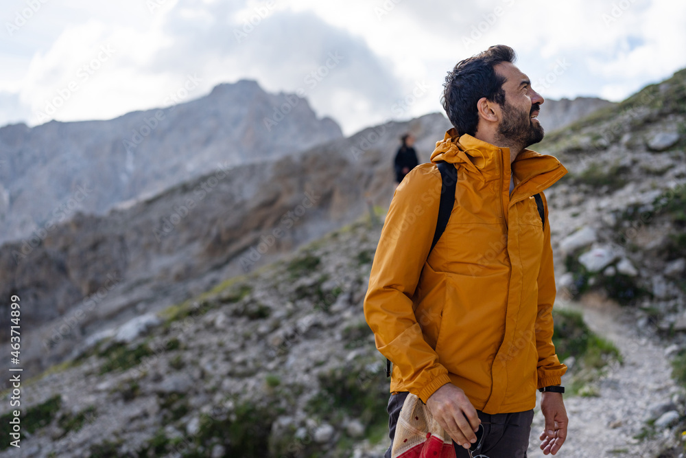 Man hiking on the mountains of Italy Man hiking on the mountains of Italy