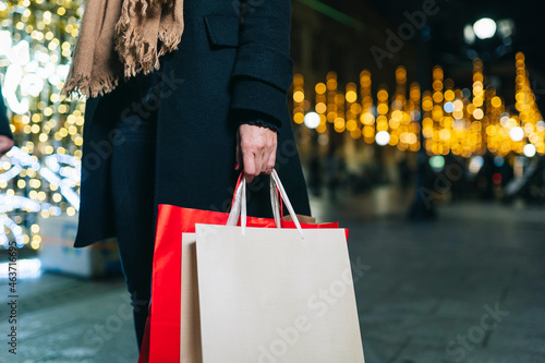 Woman with shopping bags at Xmas time photo