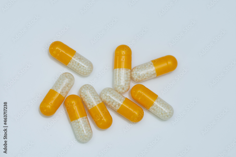 white yellow pills with white granules inside white yellow pills with white granules inside