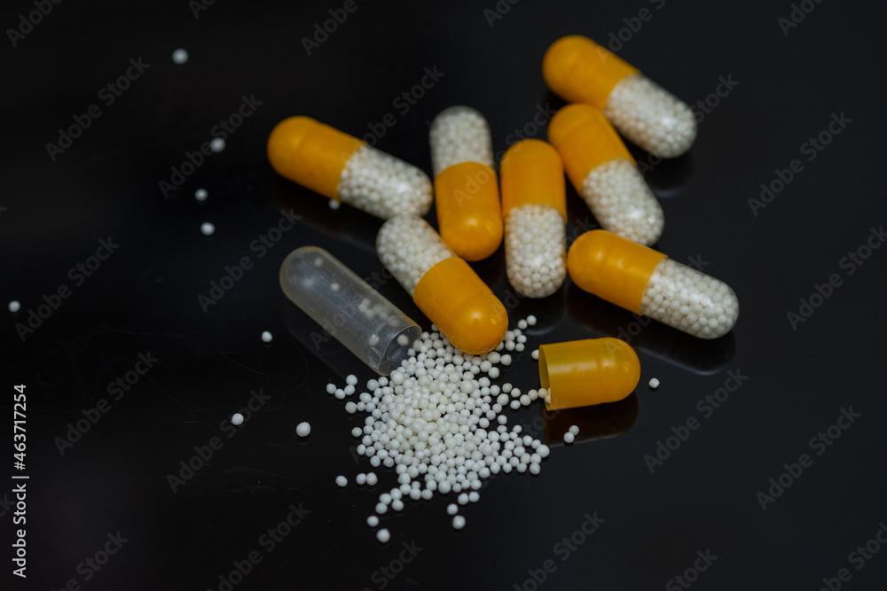 white yellow pills with white granules inside white yellow pills with white granules inside