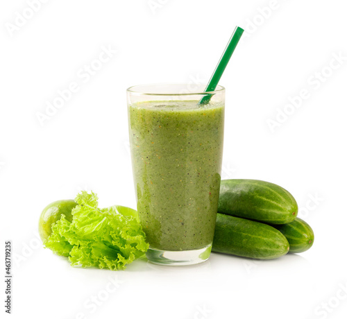 Green smoothie in glass with vegetable , lime, cucumber and lettuce isolated on white background.