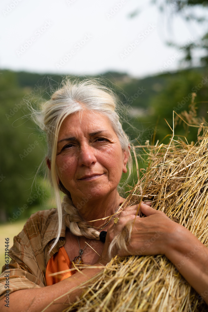 Straight portrait of a senior woman with white silver hair Straight portrait of a senior woman with white silver hair