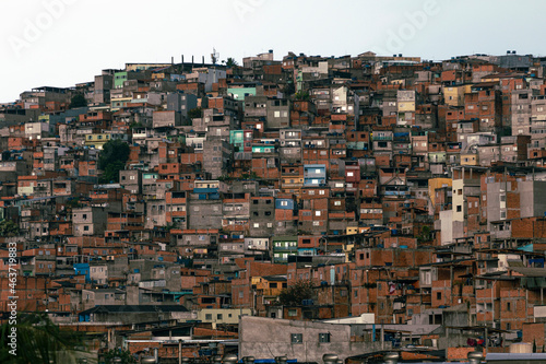 View of shacks in slum or favela in portuguese photo