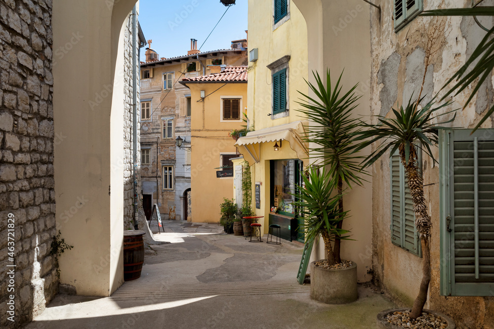 Rijeka, Croatia - August 11, 2021: Resort on the Adriatic Sea. City beaches, vegetation and buildings in Croatia. Seascape with a stone shore.