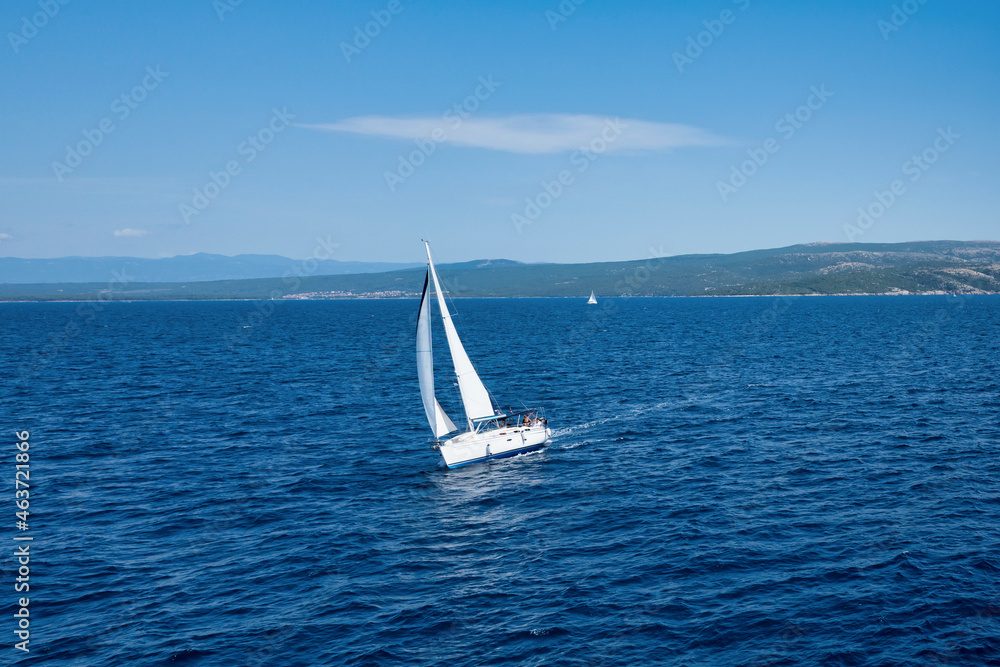 Coast of the Adriatic Sea in a resort in Croatia. Sailing yacht ride