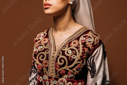 Anonymous Islamic woman in headscarf looking away photo