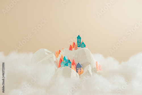 snowy winter with small houses on white plateau photo