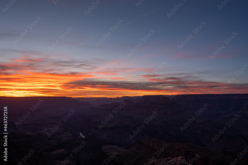 Yellow Fades to Purple Sunset Over the Edge of the Grand canyon
