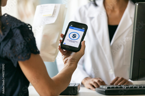 RX: Woman Uses Smart Phone To Pay