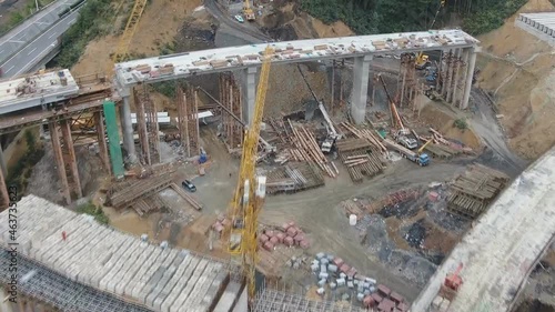 City of Kaili, Guizhou, China. Aerial view of the construction of bridges and highways, city infrastructure of Kaili. photo