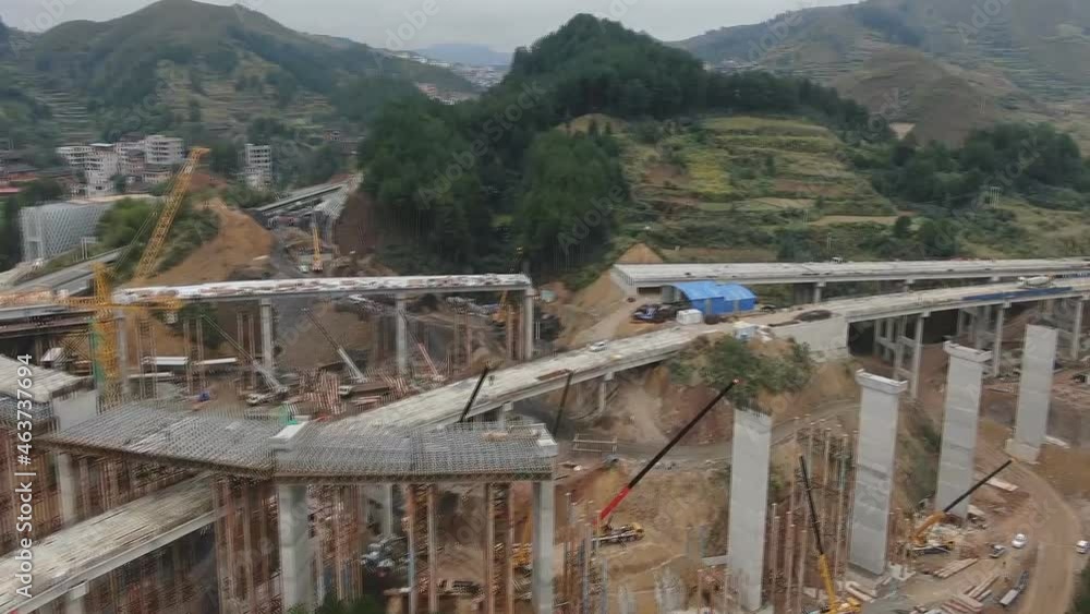 City of Kaili, Guizhou, China. Aerial view of the construction of bridges and highways, city infrastructure of Kaili. City of Kaili, Guizhou, China. Aerial view of the construction of bridges and highways, city infrastructure of Kaili.