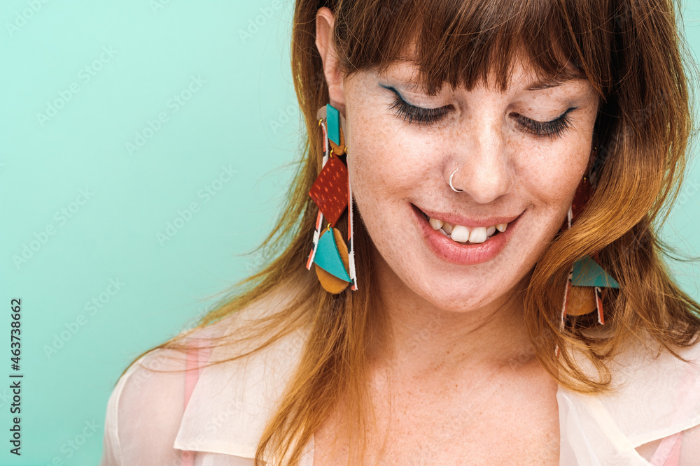 Studio Portrait Of Smiling Ginger Woman Studio Portrait Of Smiling Ginger Woman