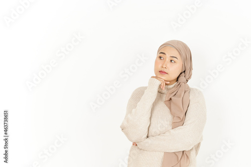 Thinking Gesture of Beautiful Asian Woman Wearing Hijab Isolated On White Background