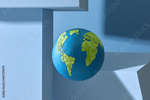 Paper craft globe in block concept for environment and conservation photo