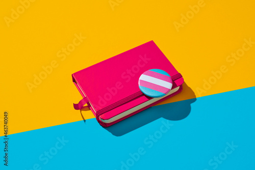 transgender pride badge on a notebook