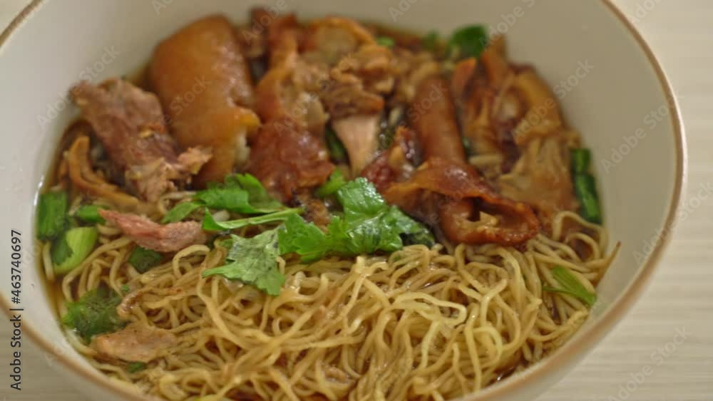 Stewed pork leg noodles in brown soup Stewed pork leg noodles in brown soup