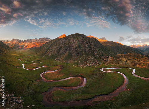 Meandering river betwen the mountains photo