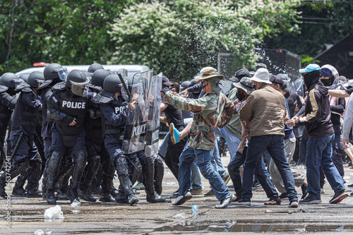 The fight between citizens and the police in the insurgency,uprising,People causing rioting against the government. photo