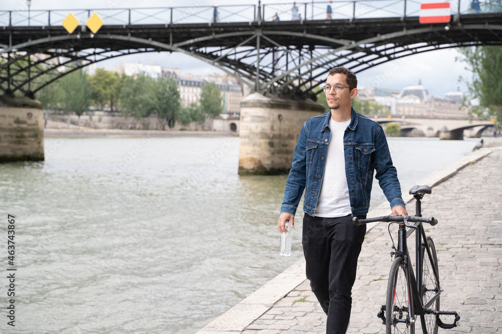 Man With Bike Walking Near To River Man With Bike Walking Near To River