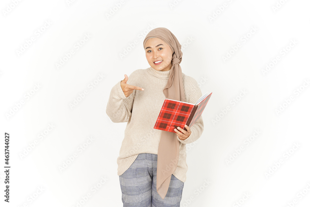 Holding Book of Beautiful Asian Woman Wearing Hijab Isolated On White Background Holding Book of Beautiful Asian Woman Wearing Hijab Isolated On White Background