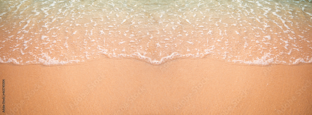 Fototapeta premium Coast sand beach white wave and bue sea close up. ocean tropical nature summer. for tourist relax vacation travel in holidays.