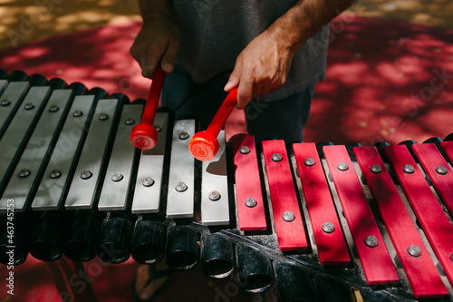 Man's hands playing xylophone photo
