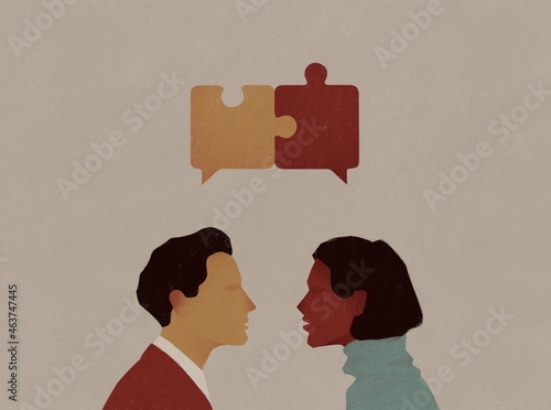 Young man and woman communicate with speech bubbles photo