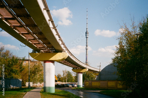 Highway overpass and a TV tower in the background photo