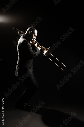 Canvas Print Trombone player. Trombonist playing jazz musician