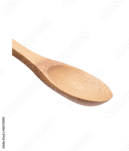 Wooden spoon on white background. The spoon is made of real wood material. Kitchen appliances in isolated with clipping path.