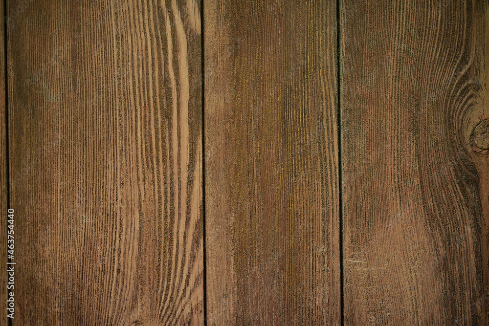 Obraz premium Wooden plank textured background material. The background texture is made of old dark brown boards, rustic eco-style, natural materials and textures
