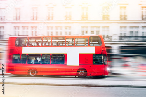 London Red Bus in motion