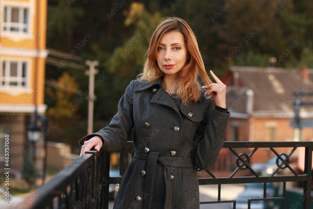 Fototapeta premium Portrait of a beautiful woman outside