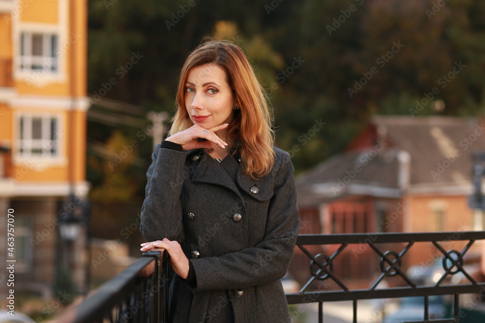 Fototapeta premium Portrait of a beautiful woman outside