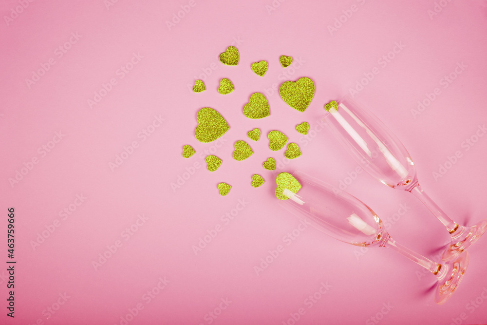 Happy Valentine's Day flatlay. Top view bottle of rose champagne in gift box, hearts, glasses on soft blue background. Valentine day or New Year greeting card Happy Valentine's Day flatlay. Top view bottle of rose champagne in gift box, hearts, glasses on soft blue background. Valentine day or New Year greeting card