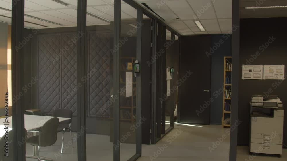 Casual dressed Woman walking fast towards meeting room in office building Casual dressed Woman walking fast towards meeting room in office building