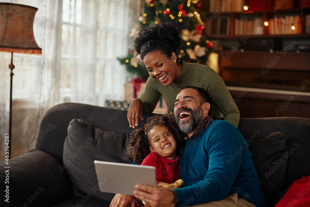 Family celebrating Christmas time via technology Family celebrating Christmas time via technology