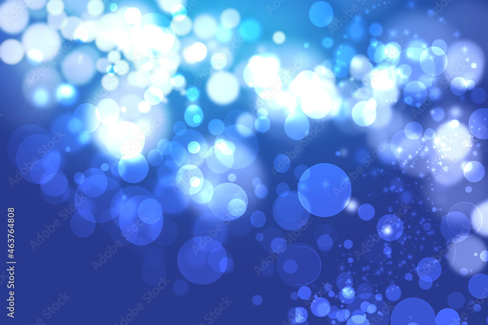 Abstract blurred festive delicate winter christmas or Happy New Year background with shiny blue and white bokeh lighted stars. Space for your design. Card concept.