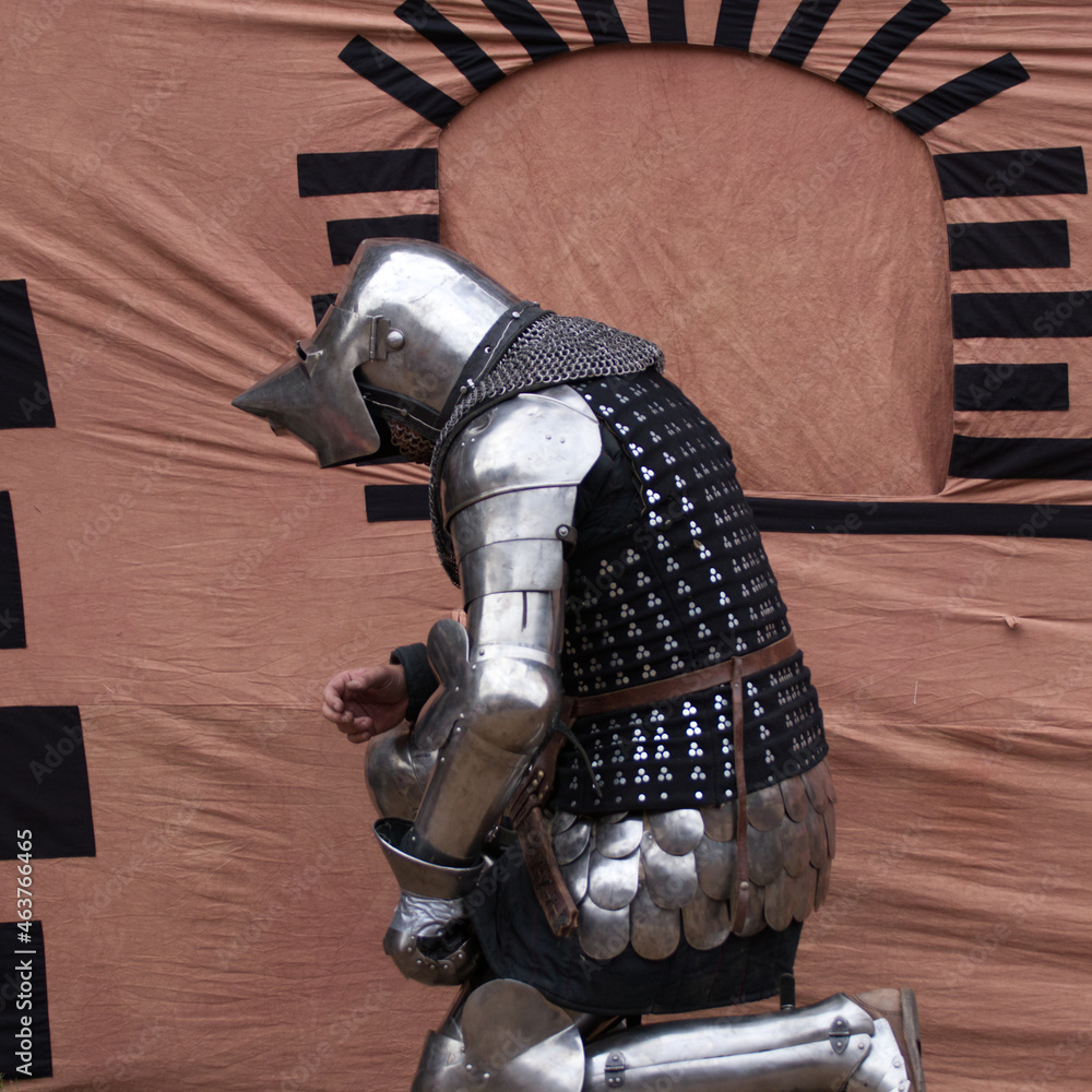 Kneeling knight Stock Photo | Adobe Stock