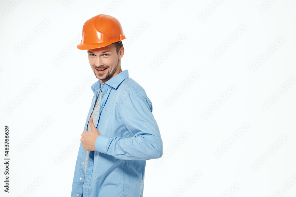 man in orange helmet Professional Job isolated background man in orange helmet Professional Job isolated background