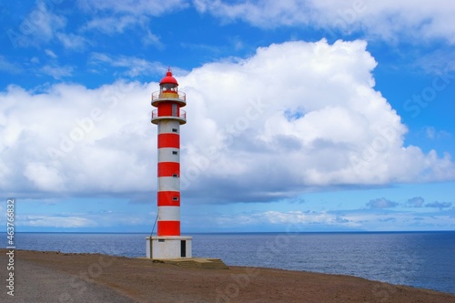 Lighthouse on the ocean coast. Faro Sardina, Gran Canaria Island, Spain