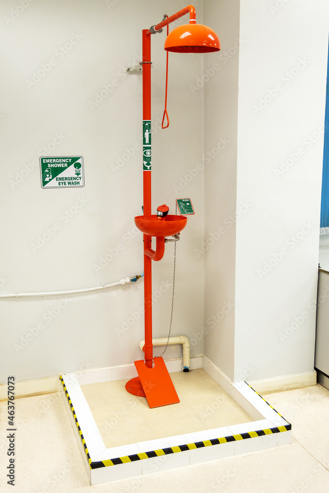Emergency shower and eye wash station installed in laboratory. Stock