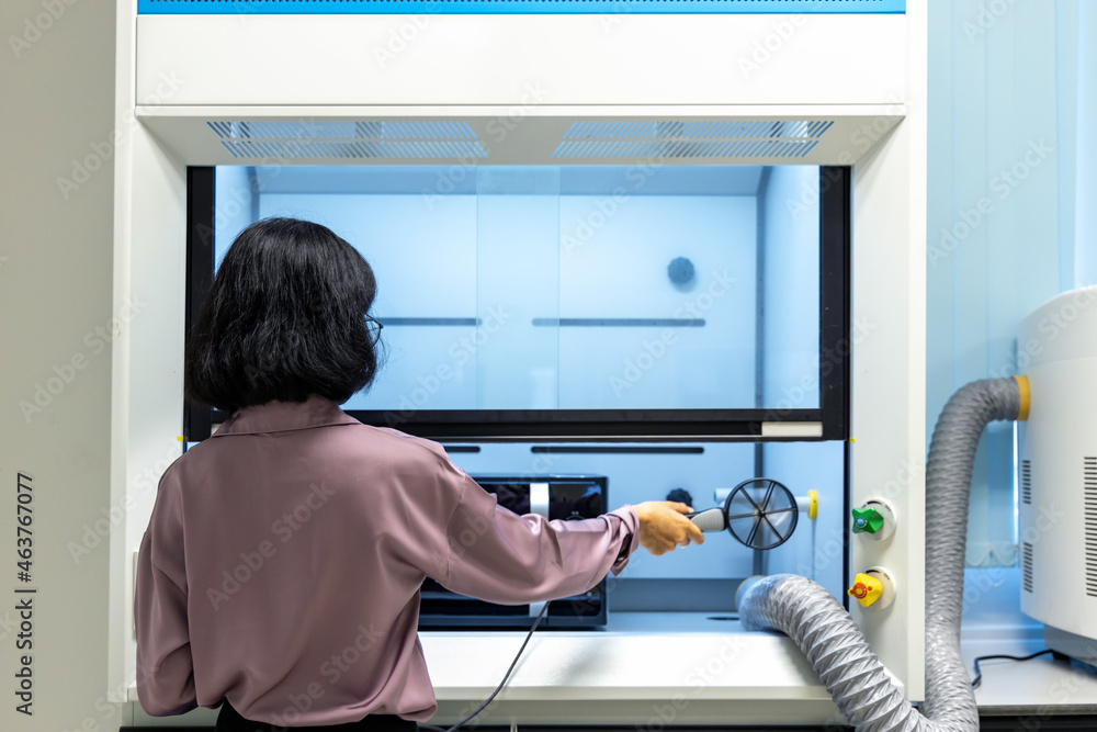 Technician woman used Anemometer handheld digital wind speed meter gauge measuring air volume