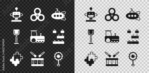 Set Robot toy, Fidget spinner, Submarine, Puzzle pieces, Drum with drum sticks, Rattle baby, Shovel and Toy train icon. Vector