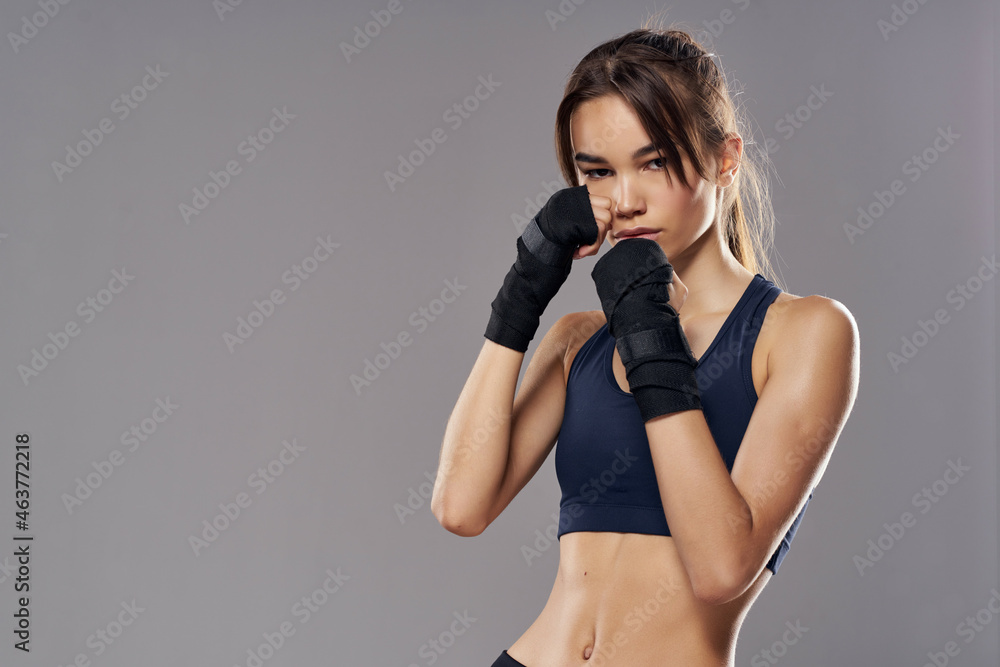 pretty woman boxing workout exercises fitness posing studio lifestyle - obrazy, fototapety, plakaty 