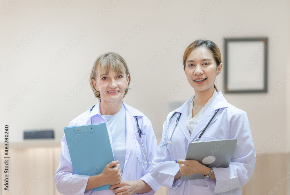 Medical team at the hospital looking at camera. Medicine and health care concepts Medical team at the hospital looking at camera. Medicine and health care concepts