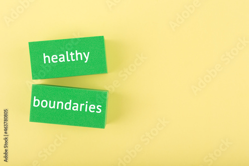 Mental health and healthy boundaries concept on yellow background with copy space