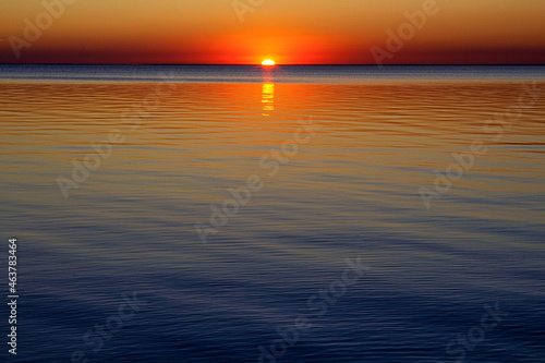 sunset on the background of the sea © Dmitriy
