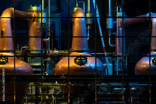 Copper stills for the production of irish Whiskey seen from the public aquare in Ardara, County Donegal - Ireland photo